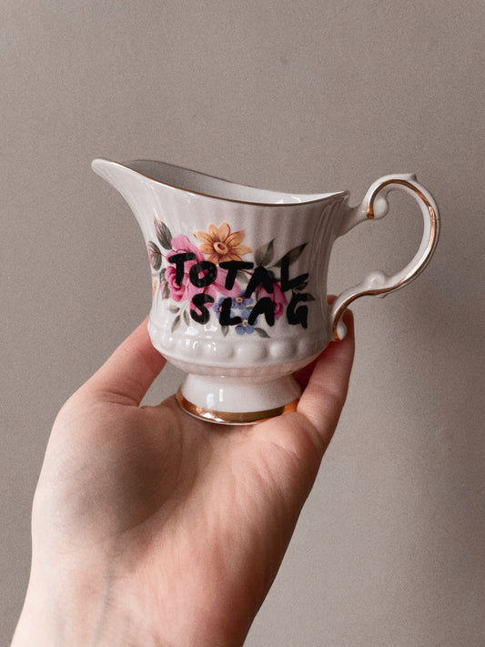 Total Slag Vintage Milk Jug